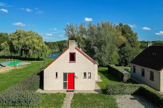 Vakantiehuis aan het meer met tuin voor 6 personen in Ewijk
