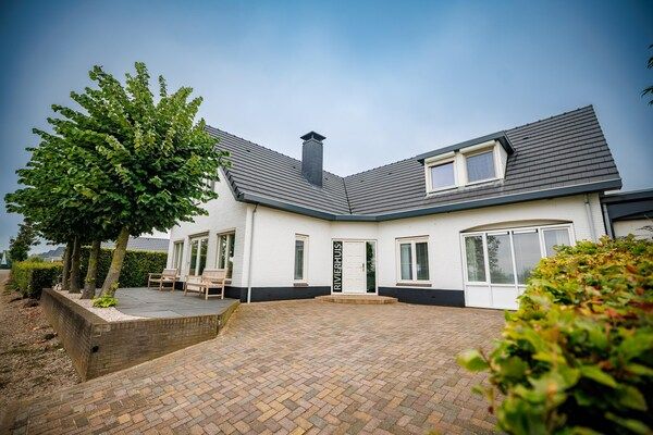 Buitenkant - Ruime villa aan het meer in Maurik (2)