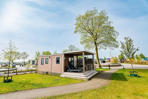 Buitenkant - Huisdiervriendelijk verblijf in een lodge in Maurik (1)