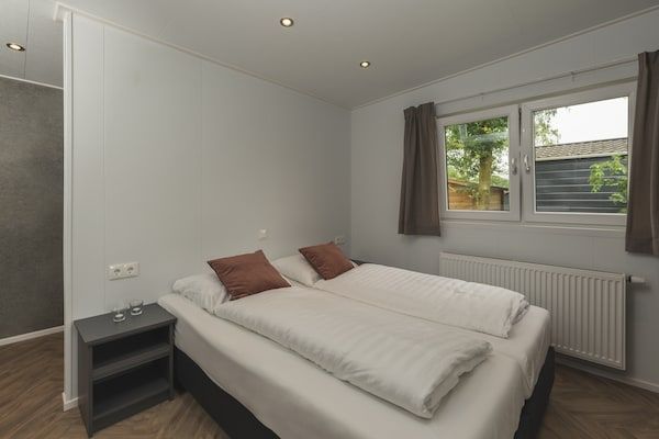 Slaapkamer - Wellness Lodge met sauna en prachtig uitzicht in Zuna (3)