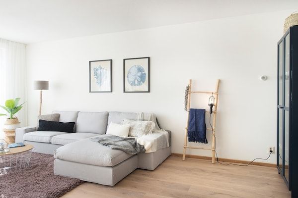 Woonkamer - Modern appartement met geweldig uitzicht in Den Haag (2)