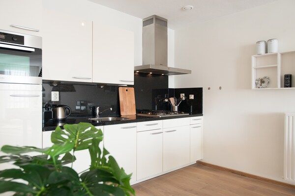 Keuken - Modern appartement met geweldig uitzicht in Den Haag (4)