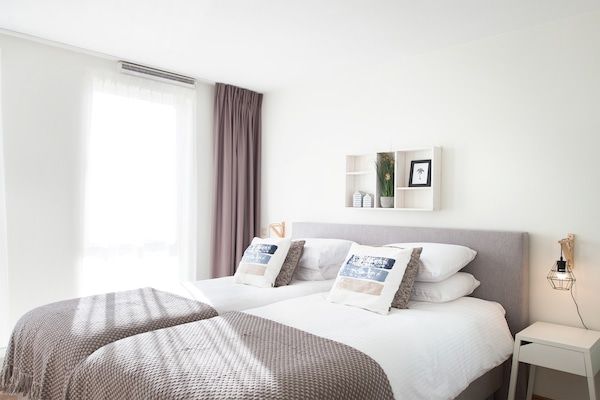 Slaapkamer - Modern appartement met geweldig uitzicht in Den Haag (3)