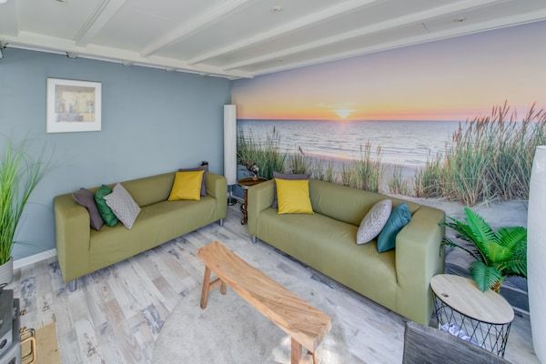 Woonkamer - Comfortabel vakantiehuis vlakbij de zee in Noordwijkerhout (3)