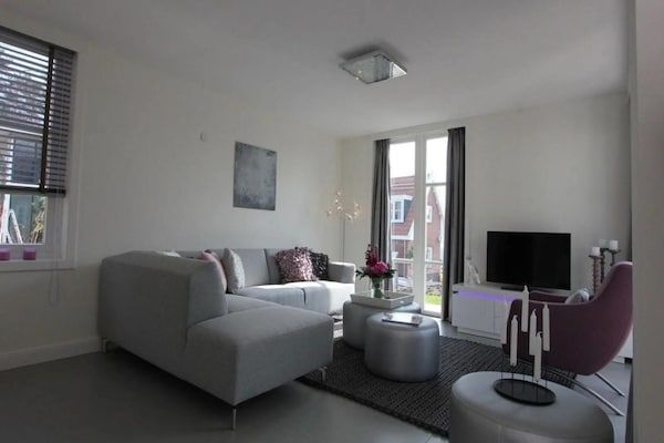 Woonkamer - Villa aan het water met dakterras voor 6 personen in Otterlo (3)