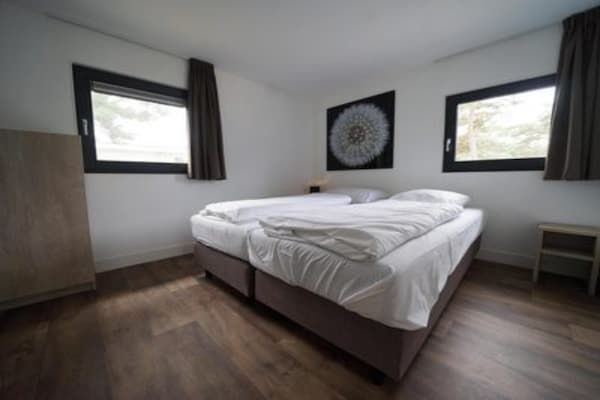 Slaapkamer - Vrijstaande chalet op de Veluwe in Otterlo (4)