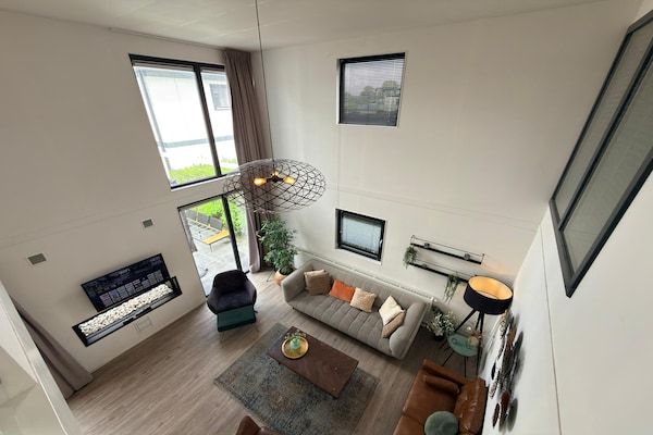 Woonkamer - Schilderachtig Veluwemeer Chalet voor 8 personen in Nijkerk (2)