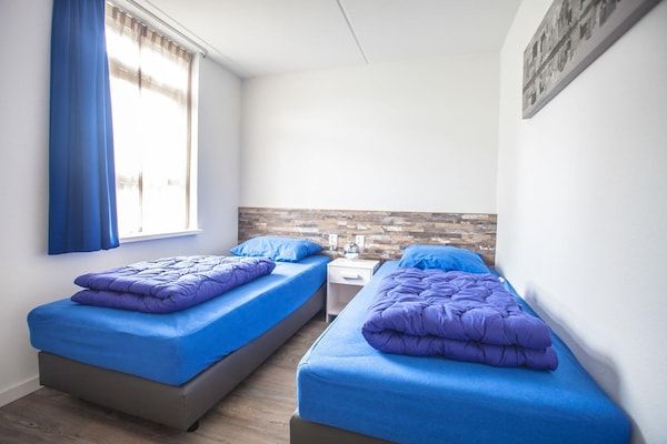 Slaapkamer - Spectaculaire villa aan het meer in Medemblik (5)