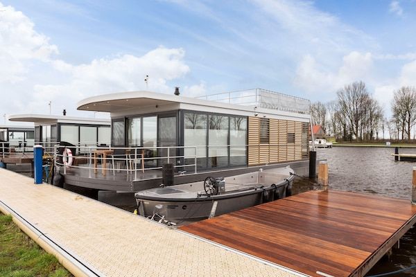 Houseboat Elysium met dakterras in Sneek - Foto 2 van 40
