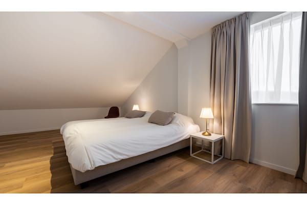 Slaapkamer - Adembenemend penthouse-uitzicht in Kamperland (4)