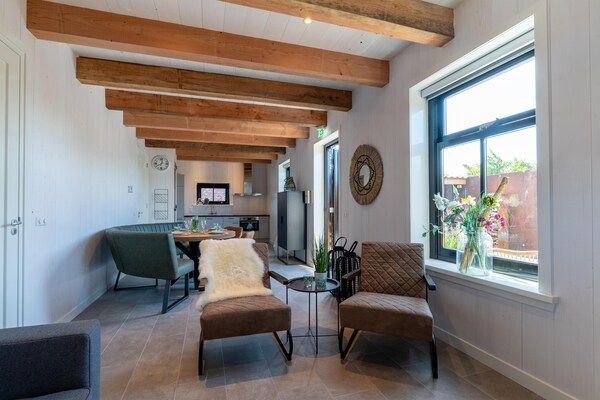 Woonkamer - Gezellig vakantiehuis in Callantsoog met wellness in Callantsoog (3)