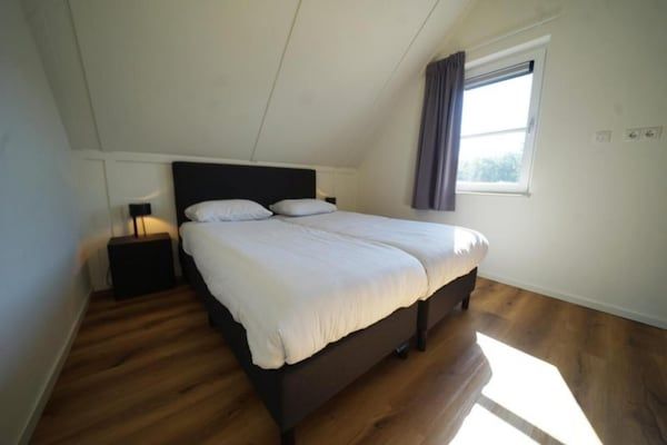 Slaapkamer - Natuurtoevluchtsoord met tuin in Lochem (4)