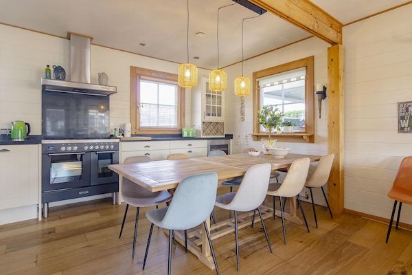 Groepswoning 2-11 personen aan het Zuidlaardermeer in Groningen met sloep optie in Kropswolde - Foto 2 van 40