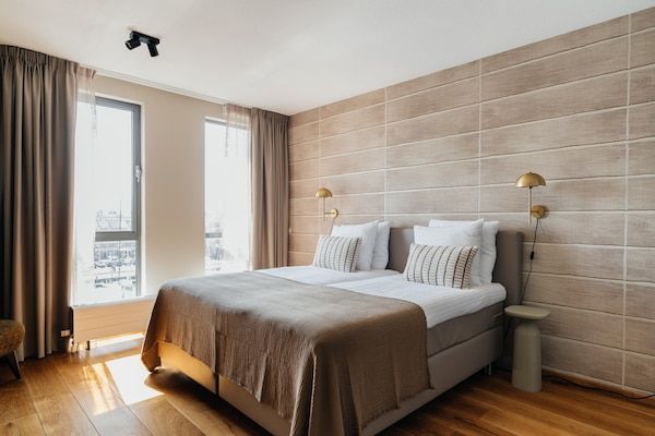 Slaapkamer - Harbor Breeze: modern verblijf in Scheveningen (4)
