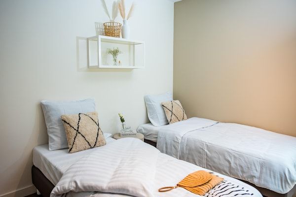 Slaapkamer - Ontsnapping aan het zwembad met sauna in Voorthuizen (5)