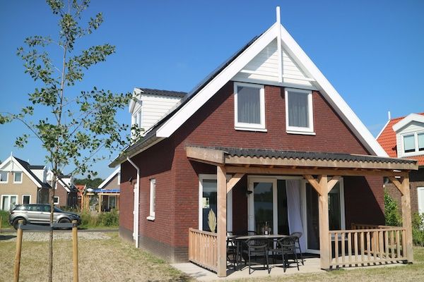 Lake view villa met zwem- vissteiger in Simonshaven - Foto 2 van 40