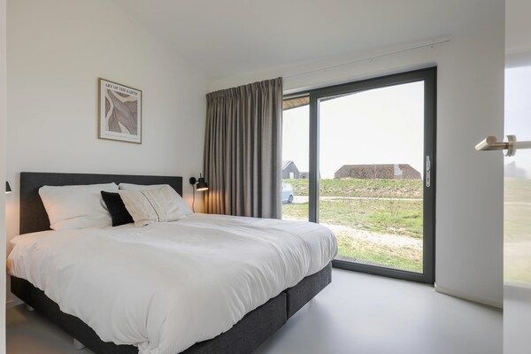 Slaapkamer - Vakantiehuis Wissenkerke bij Banjaardstrand in Wissenkerke (5)