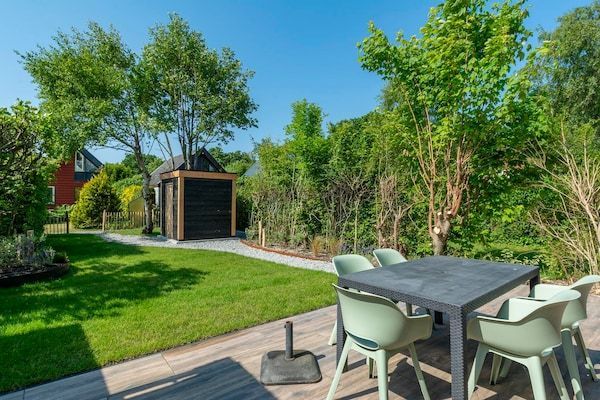 Tuin - Familiehuis bij Duinen en Strand in Sint Maartenszee (4)