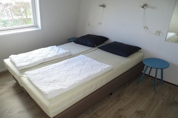 Slaapkamer - Familieverblijf – Dichtbij het strand in Breskens (4)