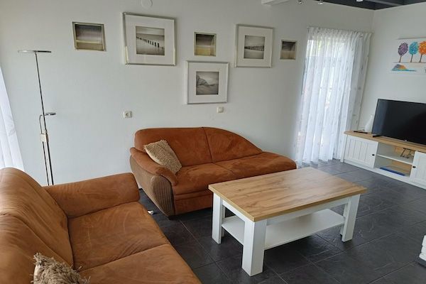 Woonkamer - Zeeuwse woning met open haard in Breskens (2)