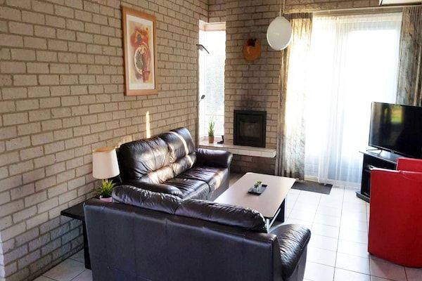Woonkamer - Huis in Breskens bij Strand en Vuurtoren in Breskens (2)