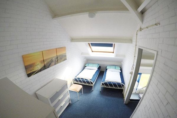 Slaapkamer - Vakantiehuis in Breskens bij het strand in Breskens (4)