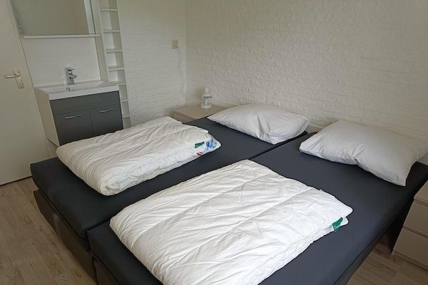 Slaapkamer - Huis in Breskens bij Strand en Vuurtoren in Breskens (4)