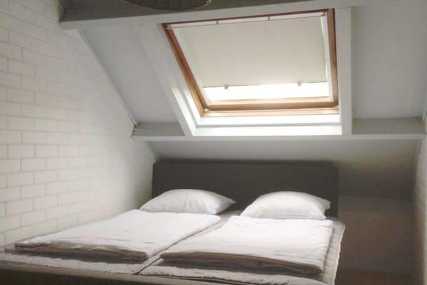 Slaapkamer - Duinrooswoning met terras in Breskens (3)