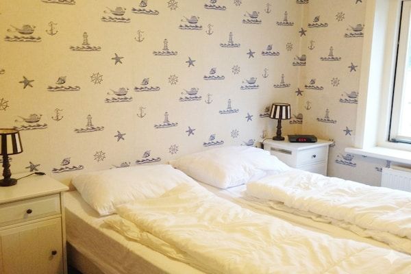 Slaapkamer - Historisch huisje met tuin in Breskens (4)