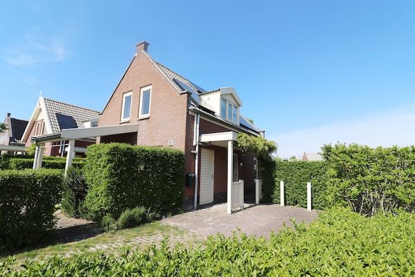 Buitenkant - Bungalow aan het water bij Rotterdam in Simonshaven (2)