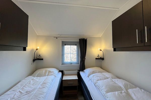 Slaapkamer - Boerderijverblijf in waterrijk Friesland in Sint Nicolaasga (5)