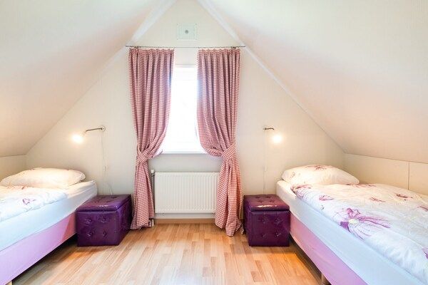 Slaapkamer - Vakantiehuis in Sint Maartenszee voor 6 personen in Sint Maartenszee (5)
