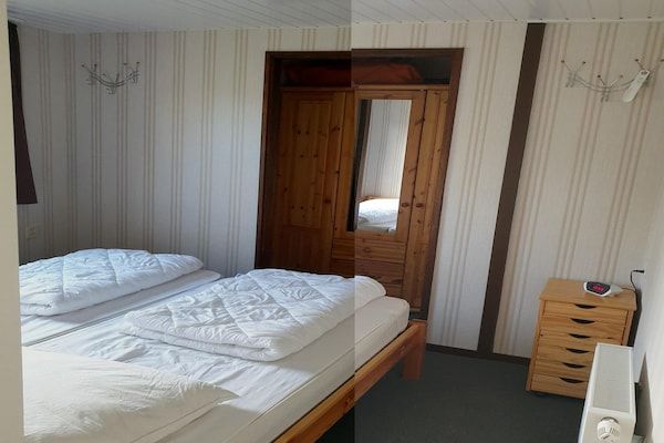 Slaapkamer - Bungalow op Eureka Park vlakbij het strand in Sint Maartenszee (5)