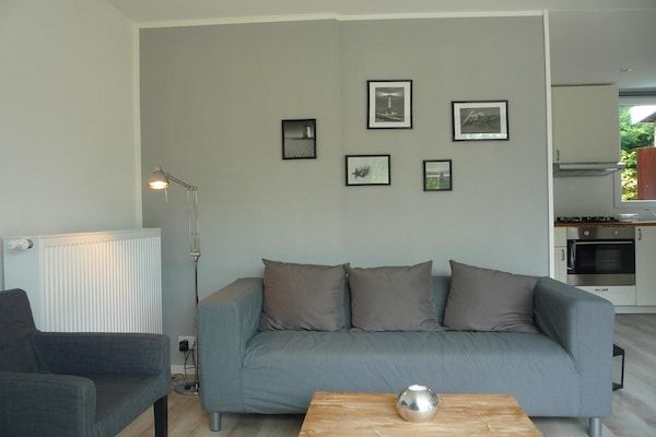 Woonkamer - Gezellig vakantiehuis vlakbij het strand in Sint Maartenszee (3)
