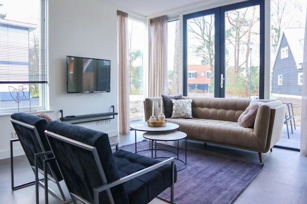 Woonkamer - Villa aan het meer voor 6 personen met sauna in Otterlo (3)