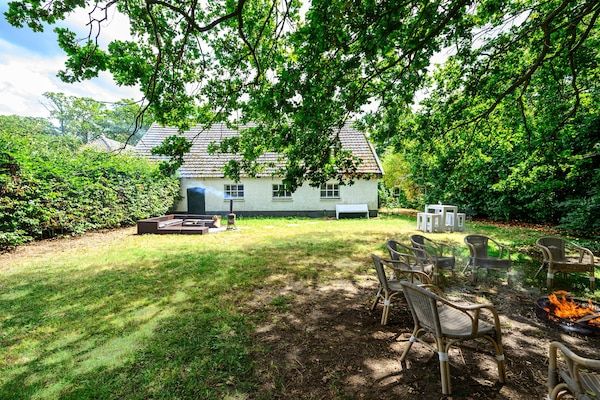 Tuin - Gezellig verblijf met recreatieruimte in Doorn (1)