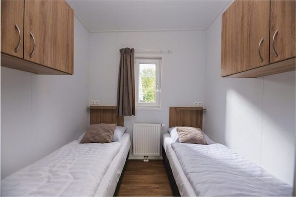 Slaapkamer - Luxe boslodge met privésauna in Rijssen (5)