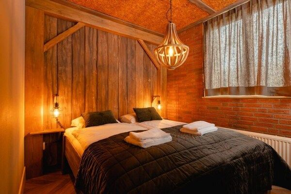 Slaapkamer - Wellnesswoning met bubbelbad in Zuna (4)
