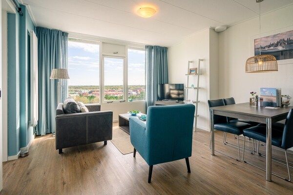 Woonkamer - 2 Persoons appartement met eilandzicht in De Koog (4)