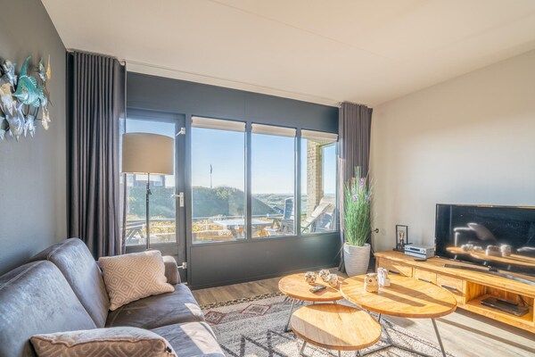 Woonkamer - 4 Persoons appartement met eiland-zeezicht in De Koog (3)