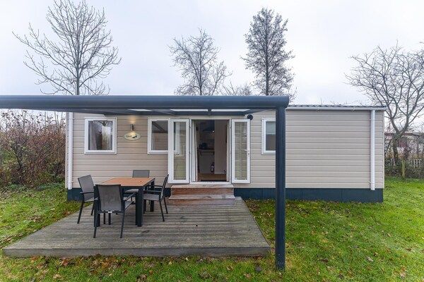 Buitenkant - Familiehuis met 2 slaapkamers vlakbij de duinen in Burgh-Haamstede (1)