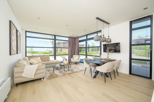 Woonkamer - Villa aan het meer met Finse sauna in Workum (2)