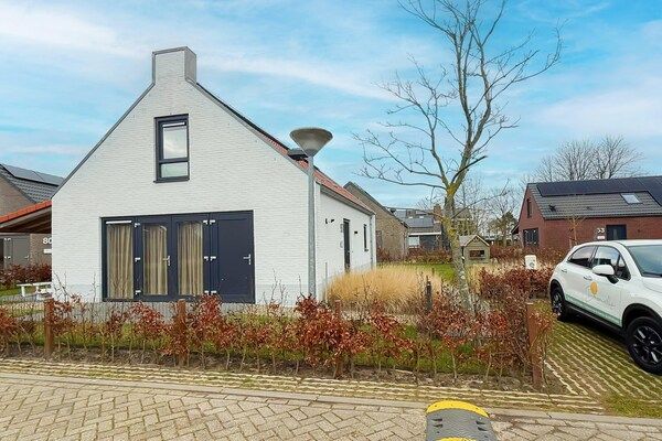 Buitenkant - Modern duinverblijf met tuin in Sint Maarten (1)