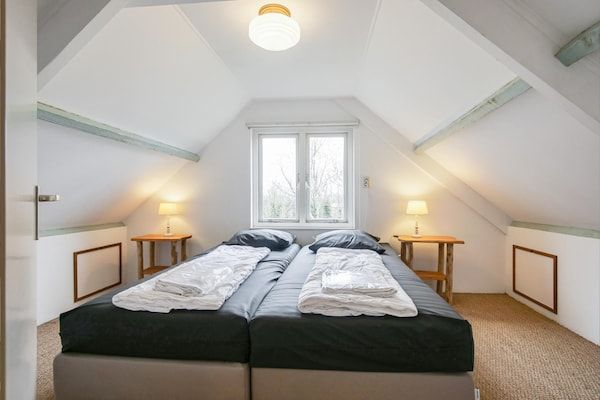 Slaapkamer - Vakantiehuis in Callantsoog vlakbij het strand in Callantsoog (5)