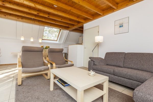 Woonkamer - Vakantiehuis in Nunspeet bij bos in Nunspeet (3)