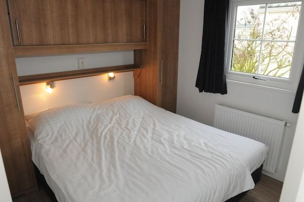 Slaapkamer - Fijne Villetta op waddeneiland Texel in Den Burg (4)