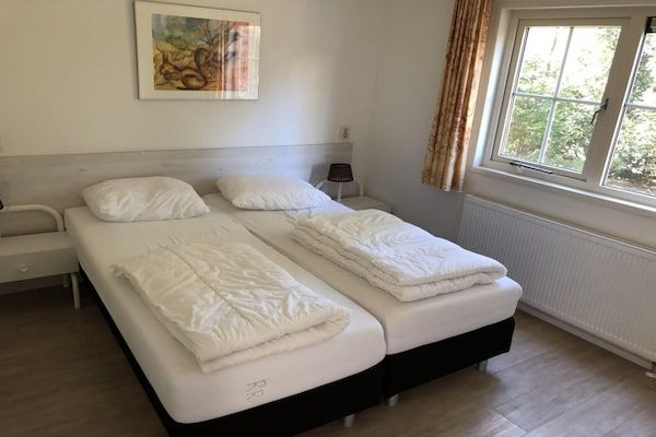 Slaapkamer - Ruim landhuischalet voor 8 personen in Lochem (3)