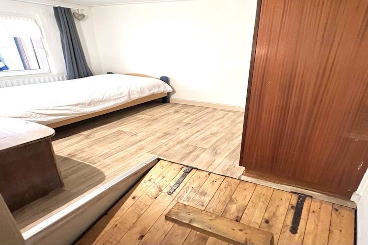 Een slaapkamer van Bi-j Moppe Door in Nederweert Eind