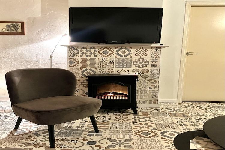 De woonkamer van Bi-j Moppe Door in Nederweert Eind