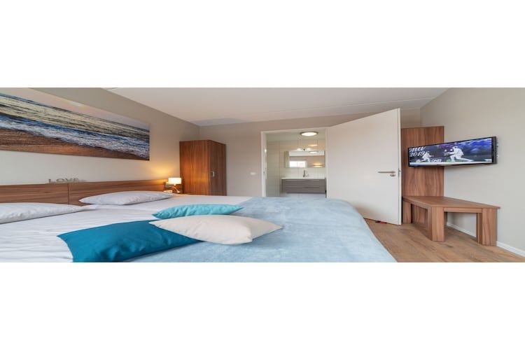 Een slaapkamer van Zeeuwse Pracht Kindervilla in Colijnsplaat